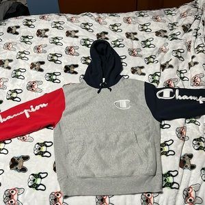 Size medium red, gray, and white reverse weave Champion hoodie!